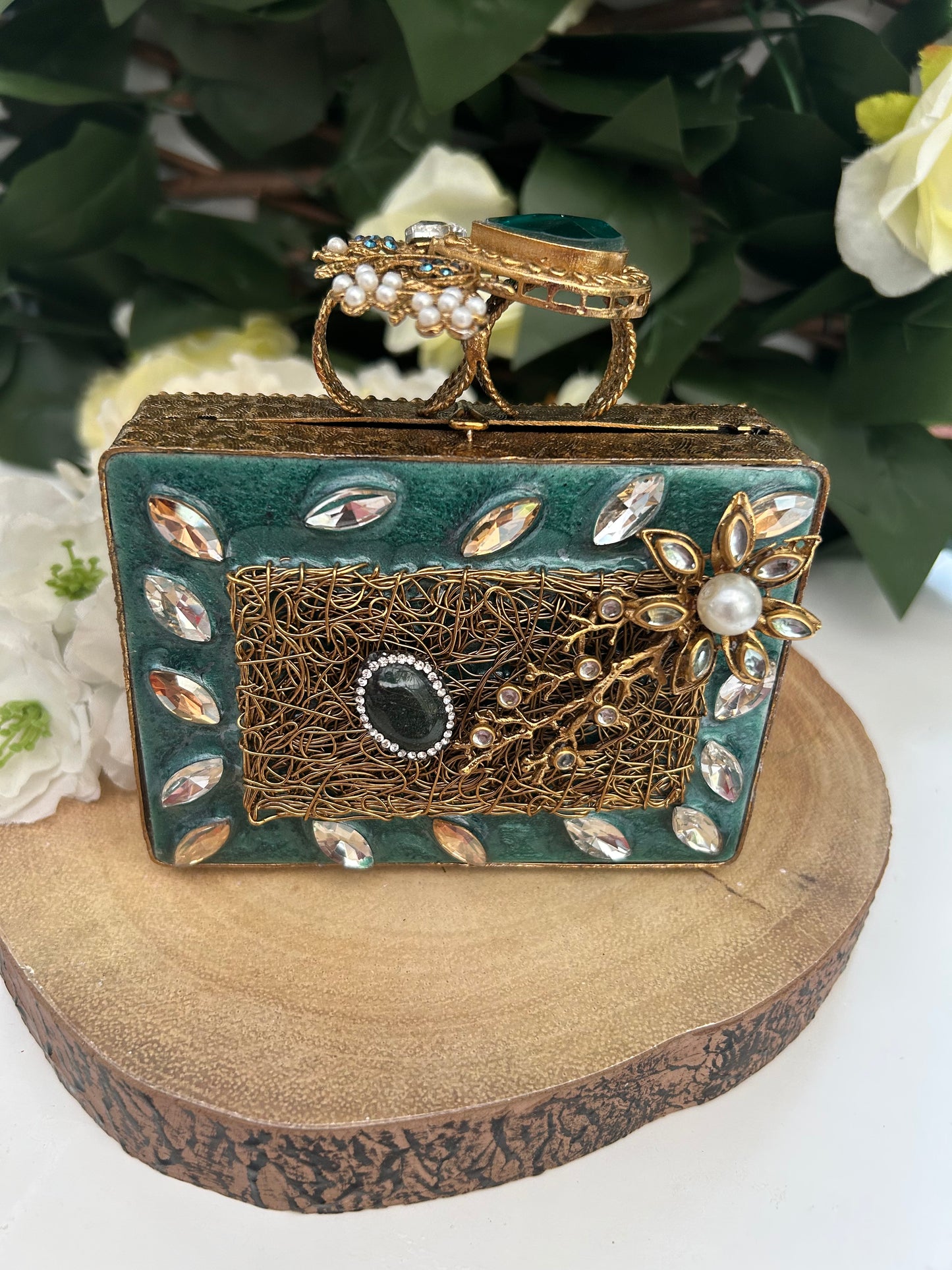 Emerald clutch
